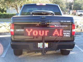 LED panel with running letters function on the back of the pickup truck