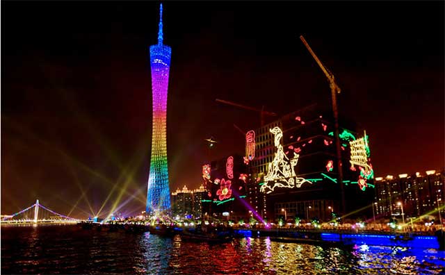 Night-time Guangzhou lit by LED screens and strips