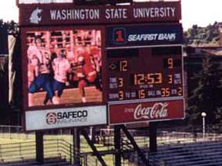 Large electronic screen at outdoor stadium in USA