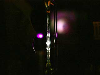 Magic-sized quantum dots in a glass flow tube produce white light
