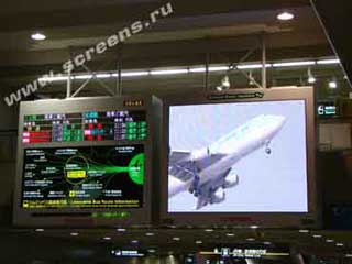 The informational LED display coupled with an LED screen in Tokyo airport Narita