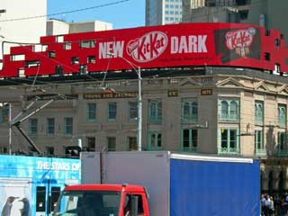 Curved LED video screen by Barco on top Young & Jackson's hotel in Melbourne