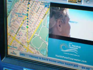 Touchpad advertizing screen in taxi cab