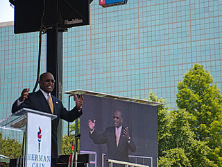 LED screen at the rally supporting Herman Cain