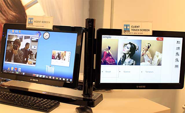 Solução U-SEE2 com as duas telas que enfrentam um agente (gerente) e um cliente