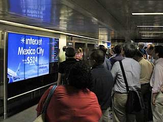 Цифровая вывеска на Penn Station в Нью-Йорке