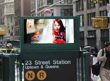 Electronic video screen at the entrance to NY metro station